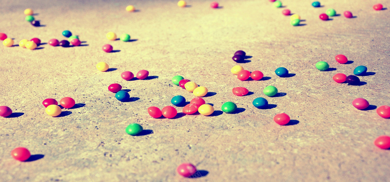 爱在七夕儿时的回忆复古巧克力糖豆背景摄影图片