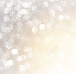 2017金色粒子浅黄光斑背景高清图片