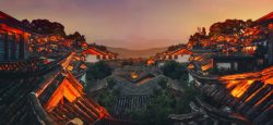 夕阳下建筑夕阳下落日云辉下的古建筑高清图片