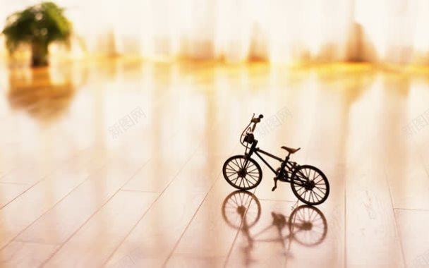 地板上的自行车模型海报背景背景