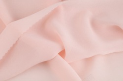 纺纱粉色柔软纺纱布料高清图片