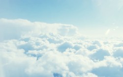 阳光穿过云层洁白云层阳光海报背景高清图片