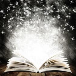 发光的书籍书本与梦幻星光高清图片