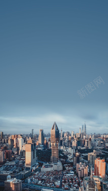 蓝色透明杯子蓝色城市建筑摄影俯瞰繁华背景摄影图片