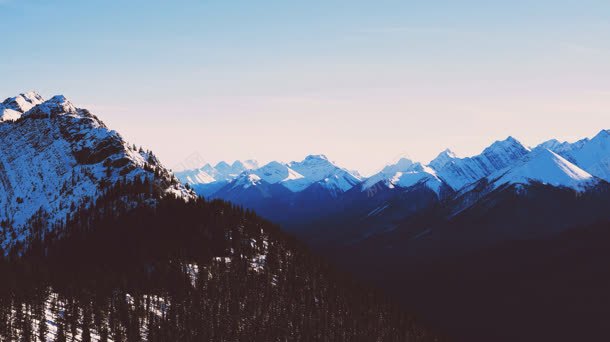 蓝天白云雪山树林海报jpg设计背景_新图网 https://ixintu.com 树林 海报 白云 蓝天 雪山