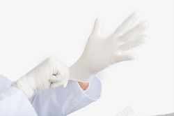 手术室医生戴医用手套的高清图片