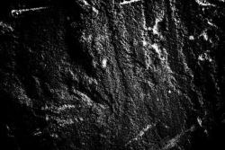 崖壁黑色岩石纹理背景高清图片