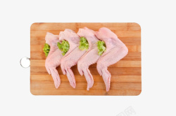 砧板上面的美食砧板香葱的大鸡腿高清图片