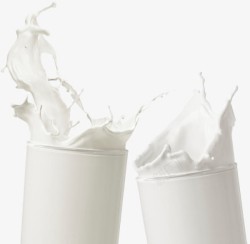 磨砂玻璃牛奶杯两杯碰撞牛奶高清图片