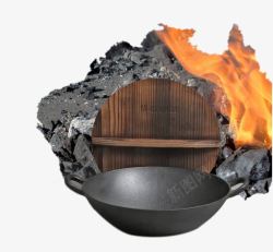 老式生铸铁锅创意煤炭旁的铸铁锅高清图片