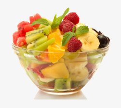 一个装满钱一个玻璃碗里装满了做沙拉的水果高清图片