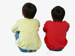 简约男孩坐在地上的两个小男孩背影高清图片