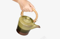 手提茶壶简洁手提茶壶倒茶一壶茶高清图片