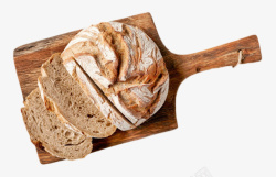 切开的面包砧板上切开带裂纹的面包俯视图高清图片