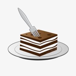 插着叉子的一盘蛋糕素材