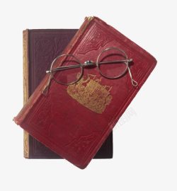 古典的红色牛皮书和眼镜素材