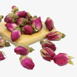 翠绿茶叶实物散开的玫瑰花茶高清图片