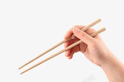 抓着木棍筷子高清图片