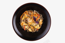 肉类制品黑色碗里的胡萝卜肉片芝麻拌面高清图片