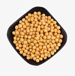 高蛋白食物黑色方形盘子里的黄豆高清图片