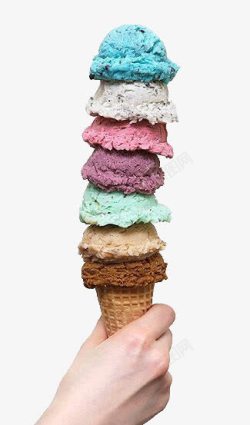 淡绿冰淇淋色手握着的层叠冰淇淋高清图片