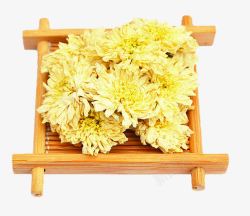 堆积的贡菊花木盒上的菊花特写高清图片