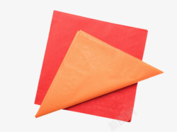 折叠餐巾红橙色折叠着餐巾纸实物高清图片