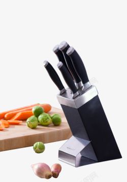 砧板蔬菜厨房的一套刀具高清图片