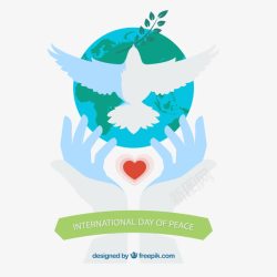 地球和平和平日背景的手释放一只鸽高清图片