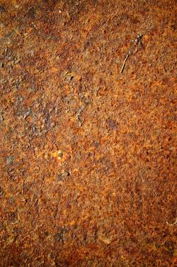 金属表面锈迹斑斑的金属表面背景高清图片