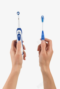 手动牙刷手拿着电动牙刷和手动牙刷实物高清图片