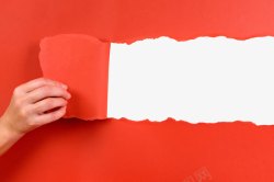 红色的墙纸撕纸手势高清图片