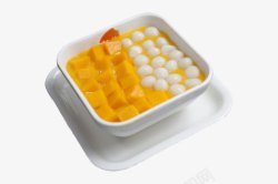 甜品丸子方盘子里的芒果和小圆子拼盘高清图片
