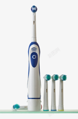 柔软牙刷头放在桌子上的电动牙刷和牙刷头实高清图片