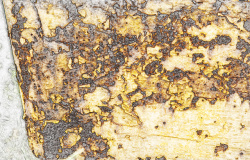 裂缝的金属背景金黄色金属氧化锈蚀腐化纹理背景高清图片