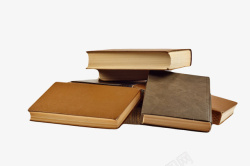 散落的书本棕色散落四周的堆起来的书实物高清图片