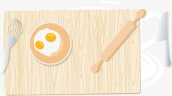 砧板上的鸡蛋和擀面杖素材