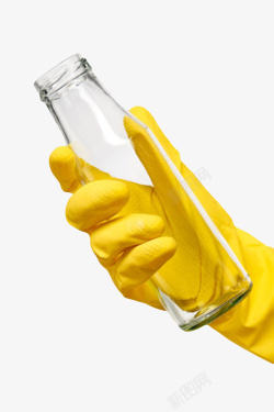 黄色胶皮手套戴着黄色塑胶手套拿着透明玻璃瓶高清图片