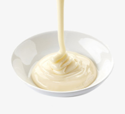 碗中的奶油挤入碗里的奶油高清图片