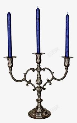 烛烛台上的三支蓝蜡烛高清图片