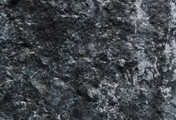 黑色石石头纹理砂石岩石横切面高清图片