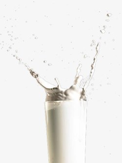 香醇可口杯子外扬起的鲜牛奶高清图片