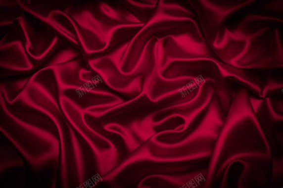 玫红色丝绸褶皱壁纸背景