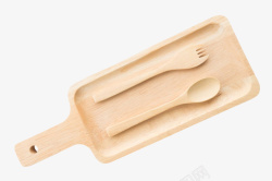 木质汤勺木质砧板上的勺子和叉子高清图片