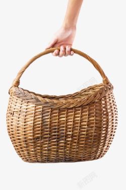 棕色容器手提着的篮子编织物实物素材