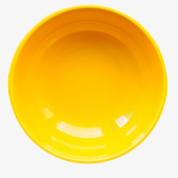 一个黄色的碗黄色餐具碗陶瓷制品俯视图高清图片