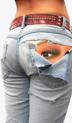 牛仔裤后面设计图片后面有眼睛的破洞牛仔裤高清图片