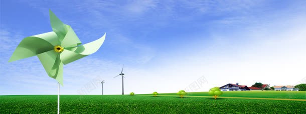 草地上的绿色纸风车背景背景