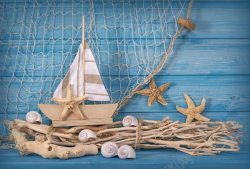 木雕船渔网与木雕船高清图片