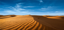 沙丘蓝天白云沙漠山丘海报背景高清图片